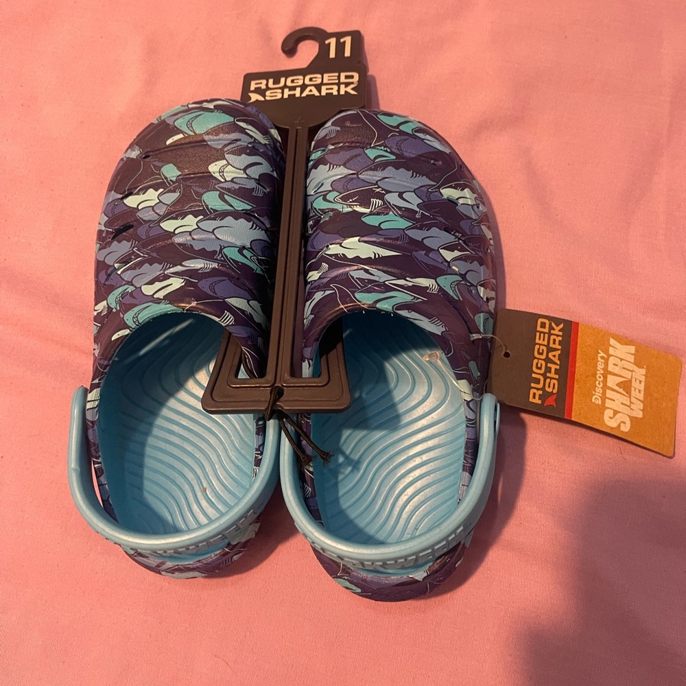Rugged shark sandals (like crocs) got all sizes for adults got sum sizes for kid